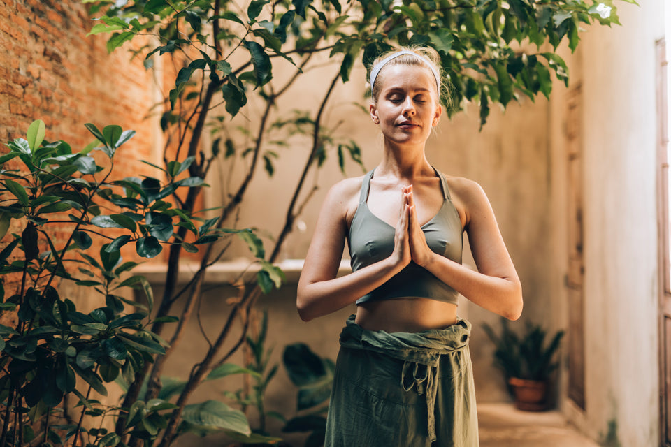 Woman in calm yoga pose
